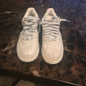 Worn grey and black suede AF1